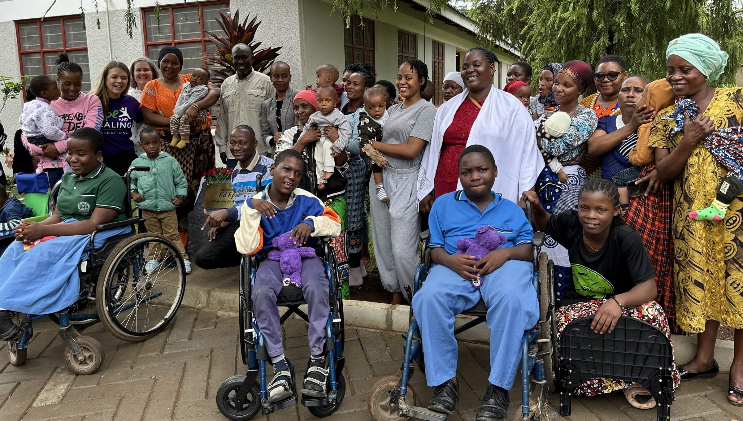 Our Executive Director, Kyalo with our partners at House of Hope in Tanzania.